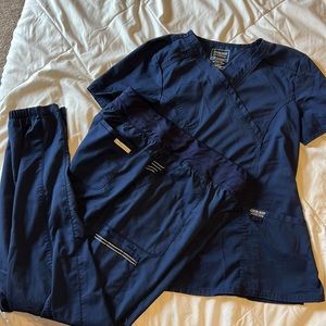 Cherokee Workwear Women’s Scrub Set. Navy. Medium top. Medium tall jogger bottom